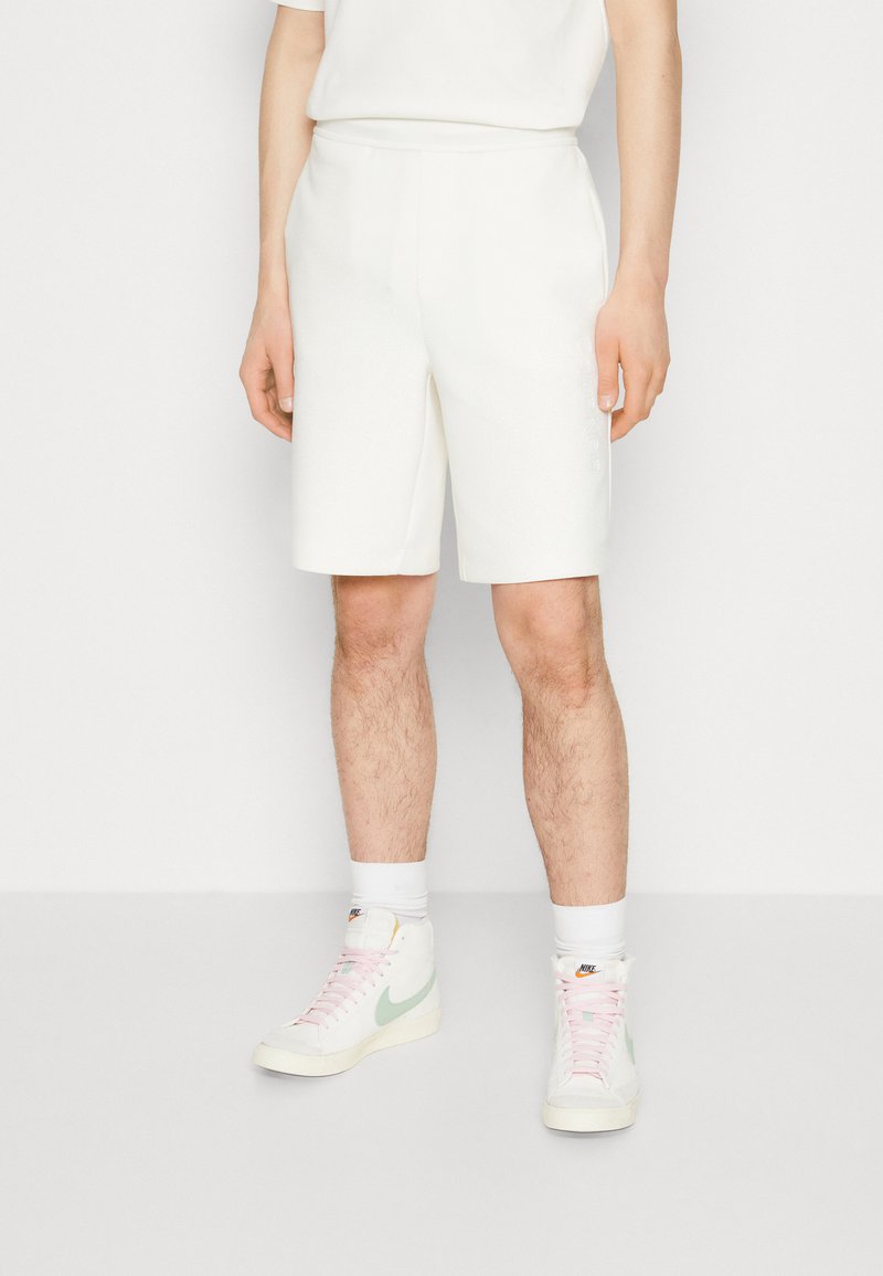 Men's Casual Shorts | Calvin Klein COMFORT DEBOSSED LOGO  - Shorts - egret/off-white - IK13678