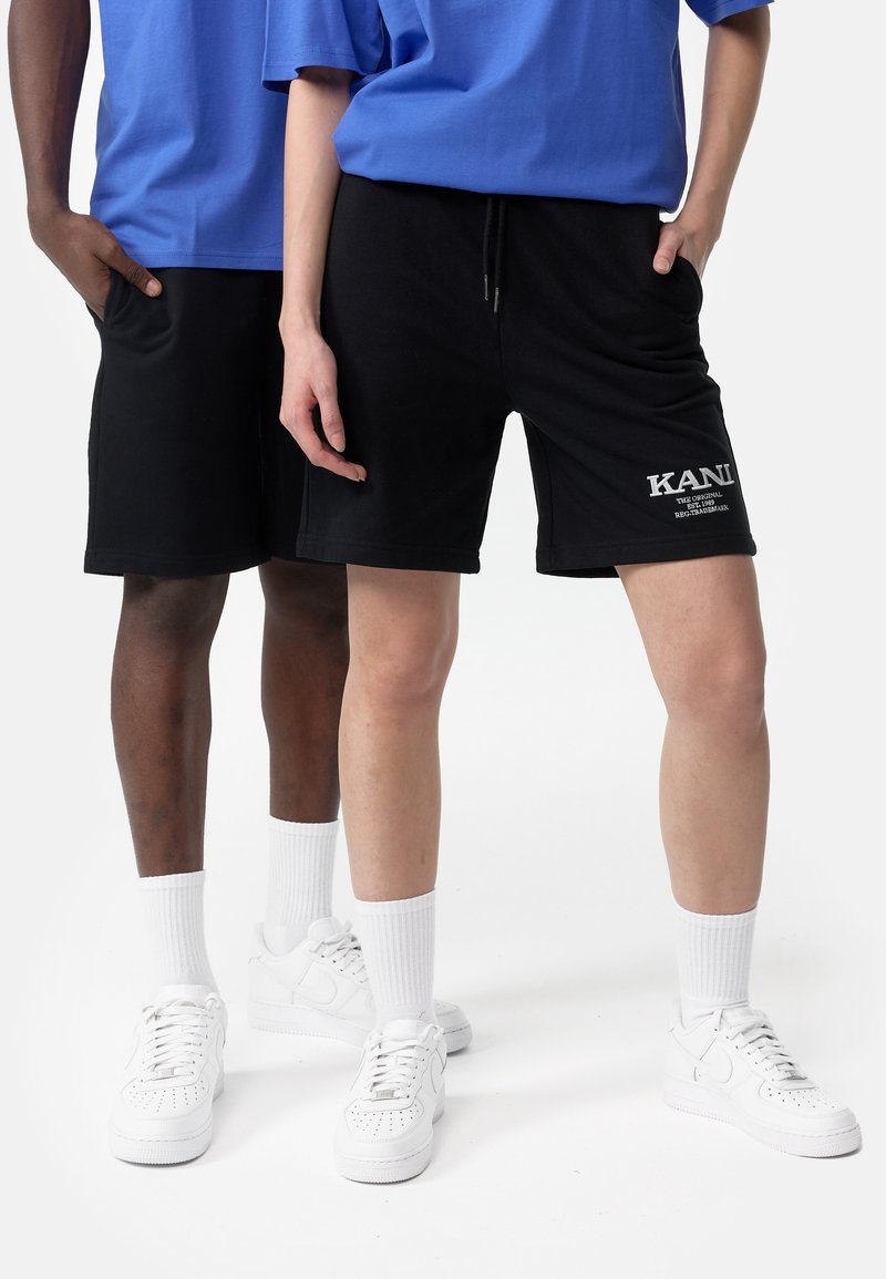 Men's Casual Shorts | Karl Kani RETRO UNISEX - Shorts - black - FW79735